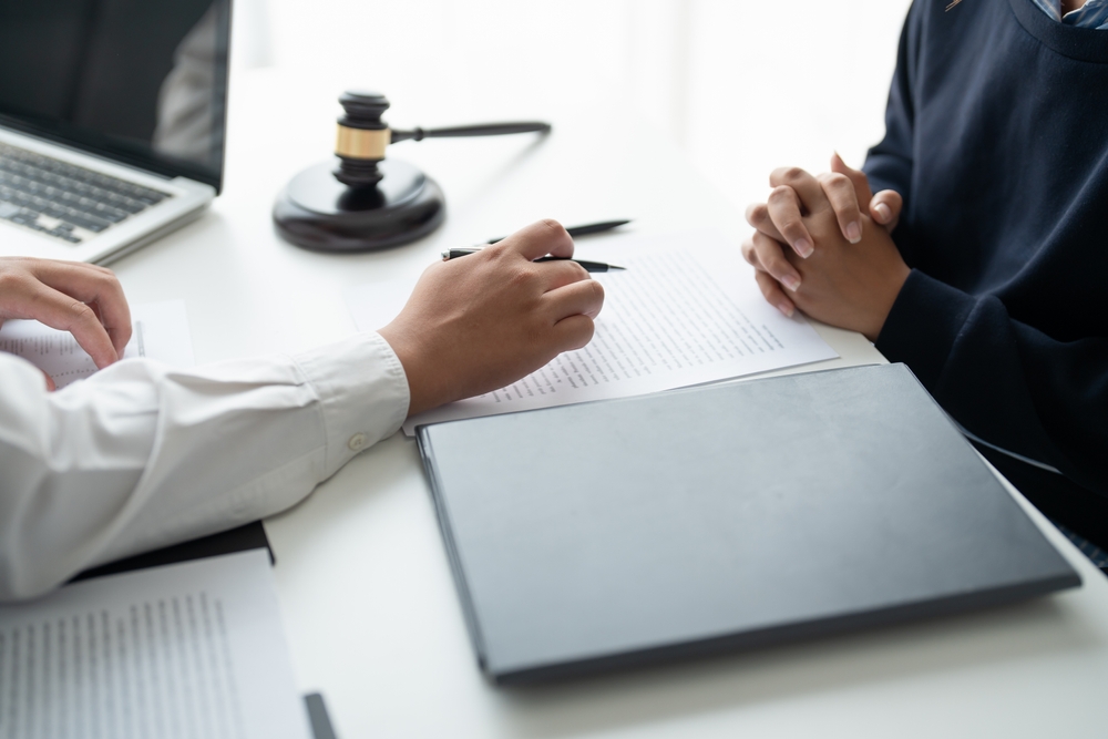 Lawyer,Businessman,Working,With,Lawbook,In,Office,Or,Courtroom,Legal